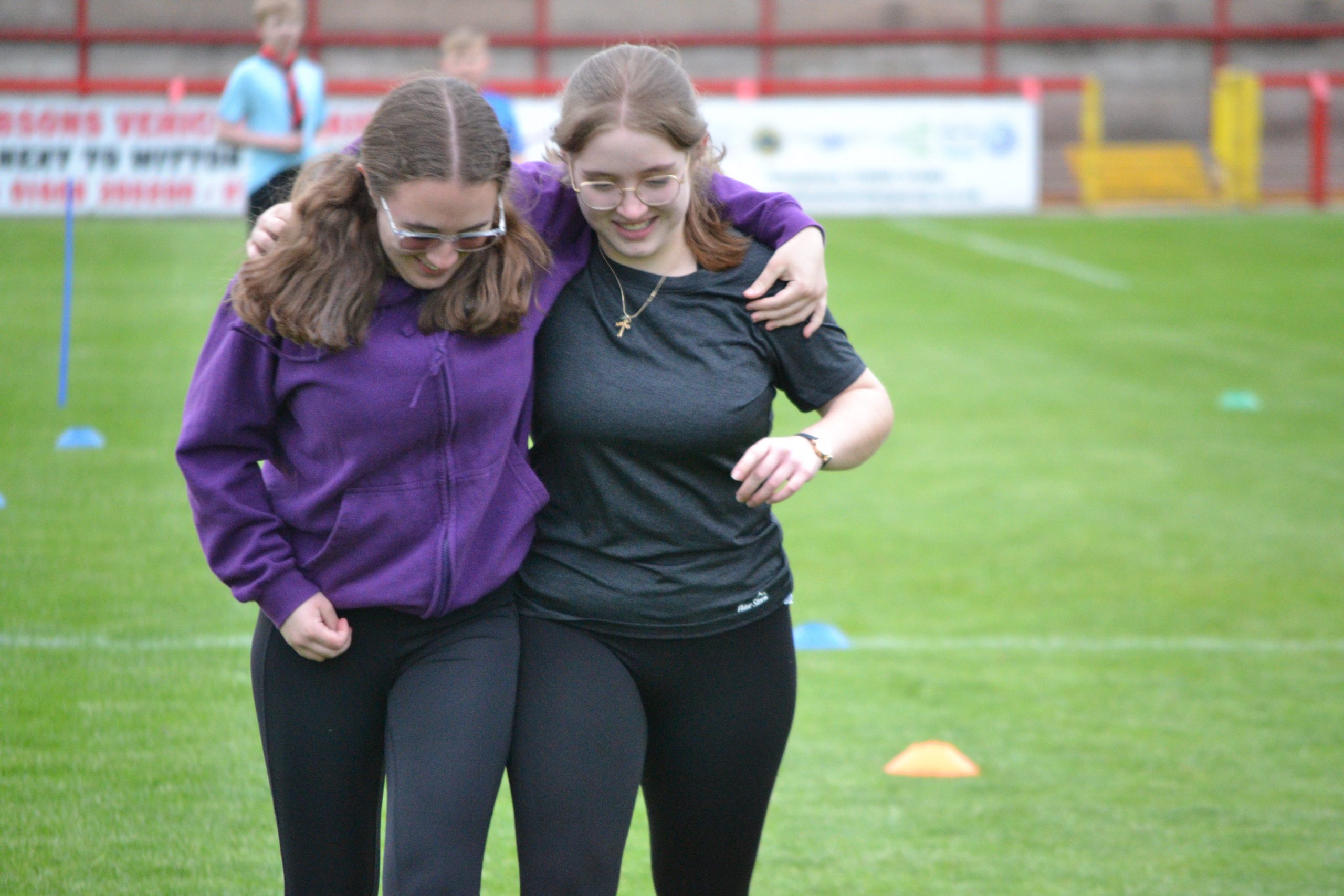 Two Explorer Scouts in a three legged race