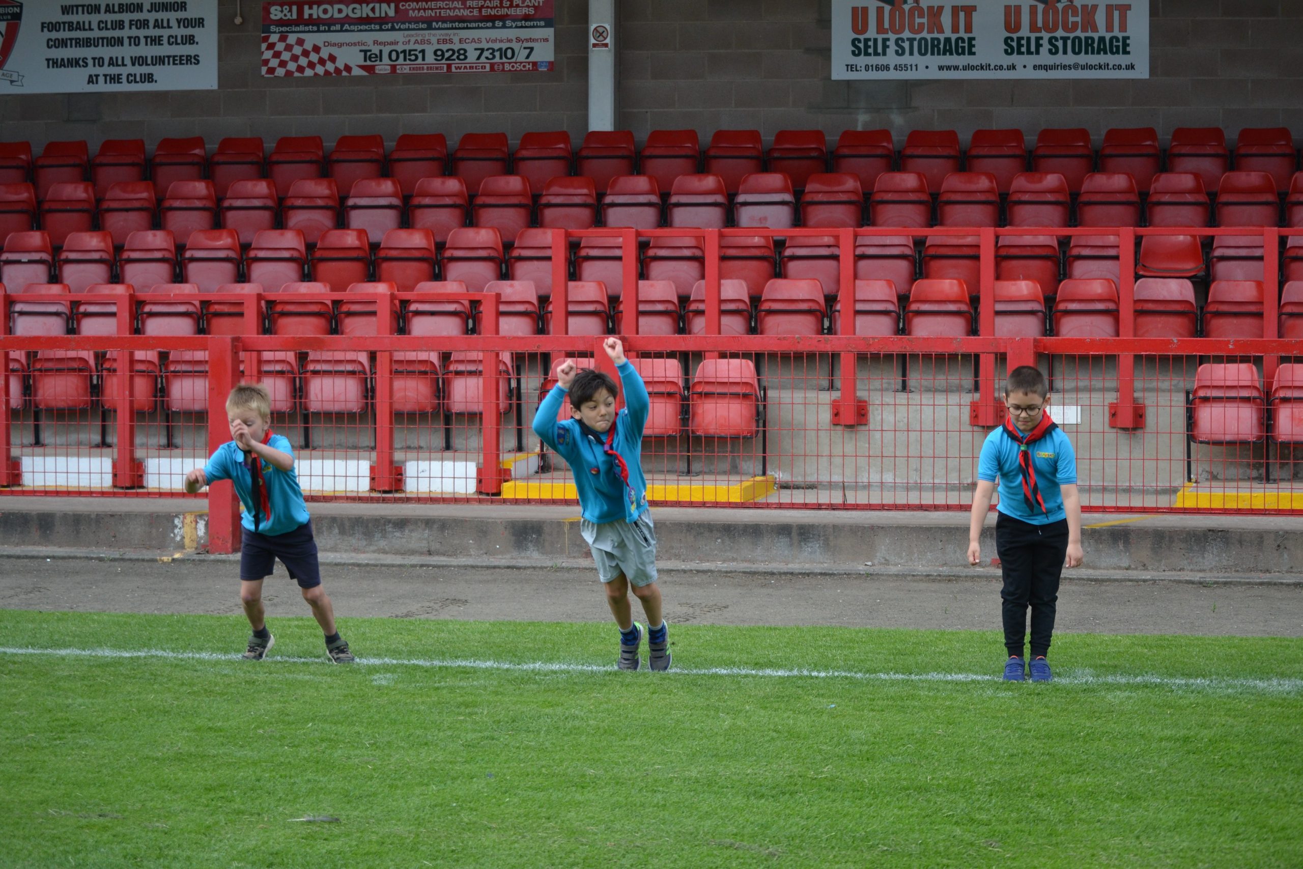 3 Beaver Scouts jumping