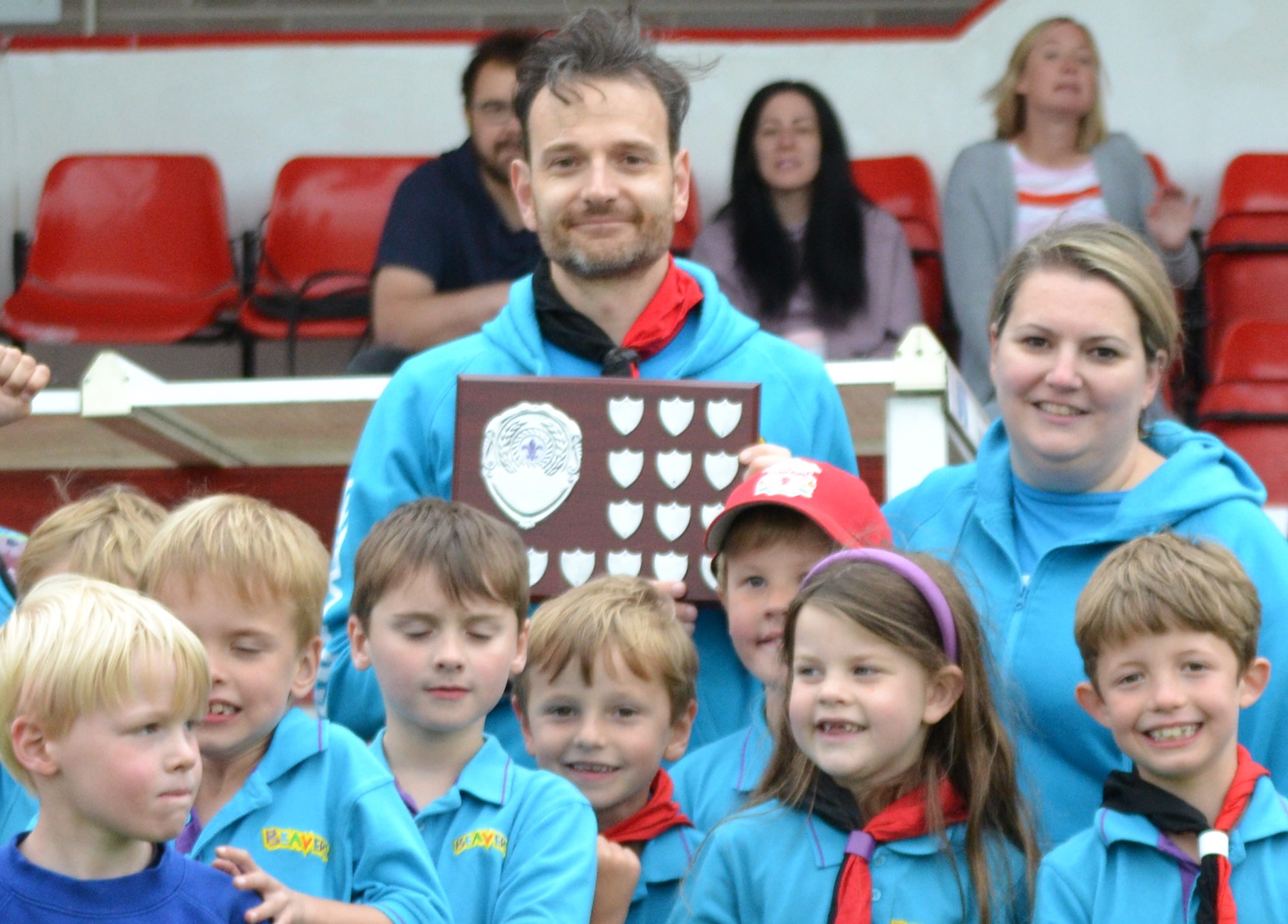 Beaver Scout colony and 2 leaders with trophy